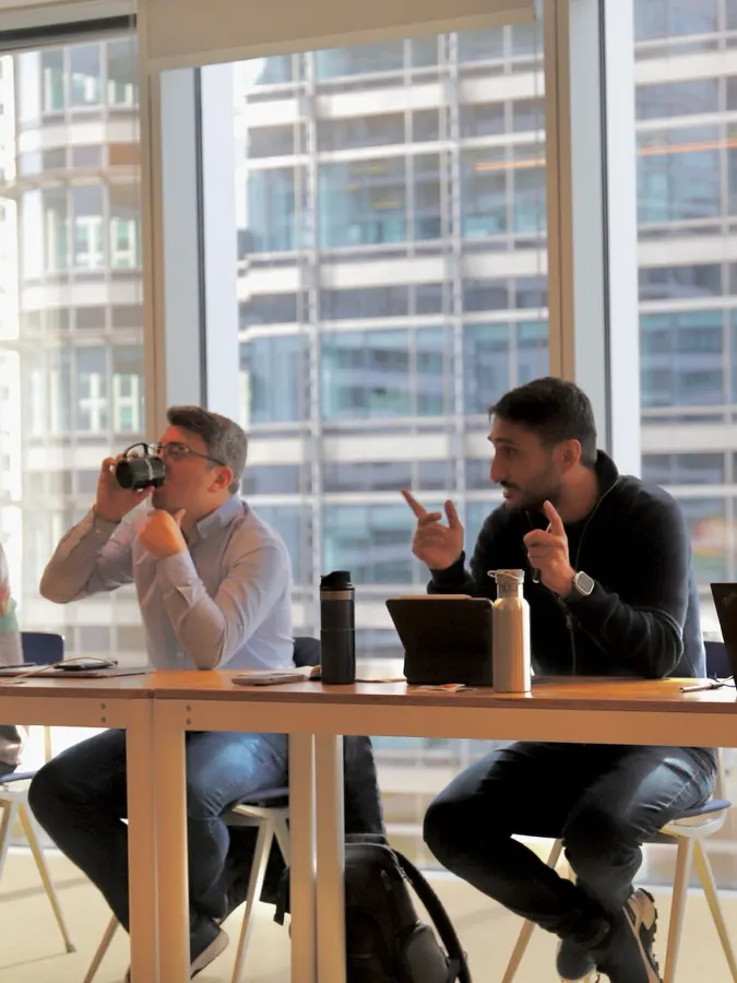 Mentor giving feedback on a founder's growth plan